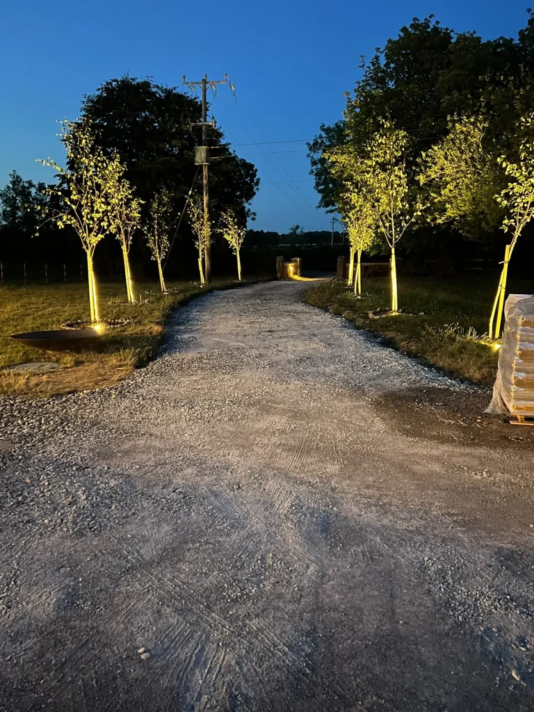 Tree-lined driveway lighting at Bunbury